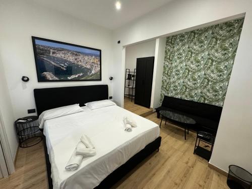 Postel nebo postele na pokoji v ubytování B&B Villa Nunzia
