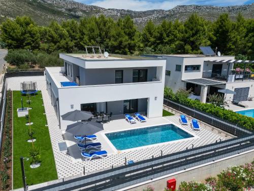 an image of a villa with a swimming pool at Holiday Villa MI in Orebić