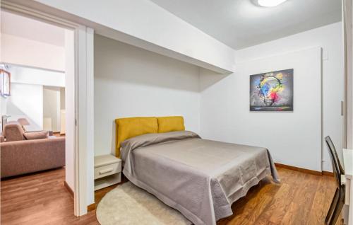 Katil atau katil-katil dalam bilik di Cozy Apartment In Recco With Wifi