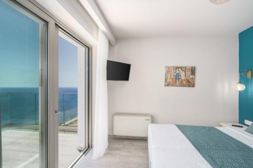 Postel nebo postele na pokoji v ubytování New seaview villa Venetsianiko with Private Pool & BBQ close to the beach