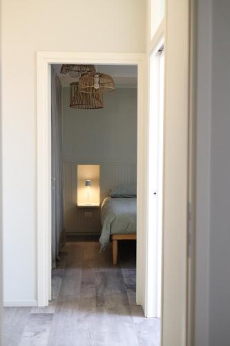 Letto o letti in una camera di Lullaby - Attico sul Porto Canale di Cesenatico