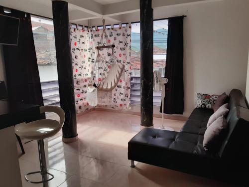 Posezení v ubytování Apartamentos amoblados y Aparta Hotel La Unión Valle