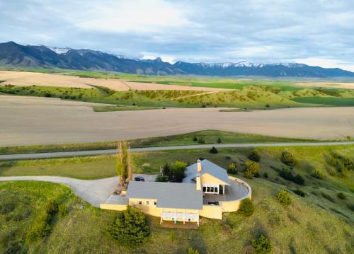an aerial view of a house in the middle of a field at Theisen Vacation Home in Belgrade