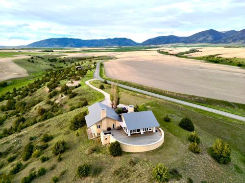 an aerial view of a house in the middle of a field at Theisen Vacation Home in Belgrade