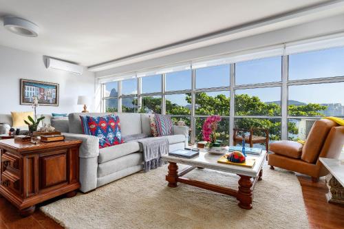 Гостиная зона в Apartamento vista mar e vista pão de açúcar