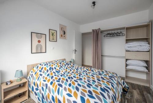 Postel nebo postele na pokoji v ubytování Le Royal George - Appartement 4 pers
