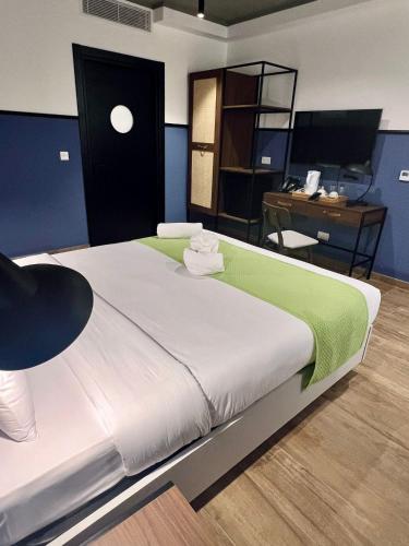 Ένα ή περισσότερα κρεβάτια σε δωμάτιο στο South32 Hotel