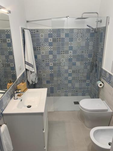 Ένα μπάνιο στο Il Porticciolo House