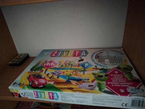 a box of toys sitting on top of a table at Apartman MAJA in Bajina Bašta