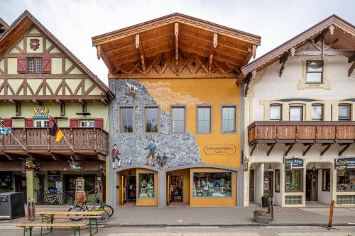 a group of buildings on a street at Bavarian Lodge Suites in Leavenworth