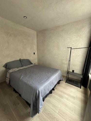 Ένα ή περισσότερα κρεβάτια σε δωμάτιο στο lofts