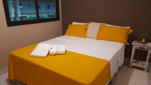Katil atau katil-katil dalam bilik di Buraquinho I Villas Praia Moderno e Aconchegante