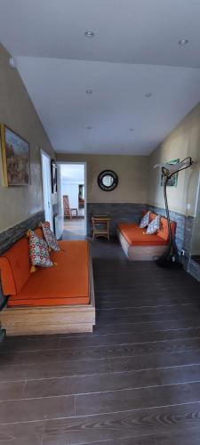 a room with two beds in a room at Résidence Villa Nova in Tiuccia