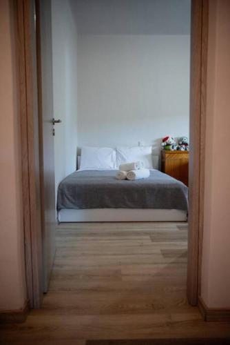 a bedroom with a bed in a white room at Betty's 4 Seasons in Agria in Agria