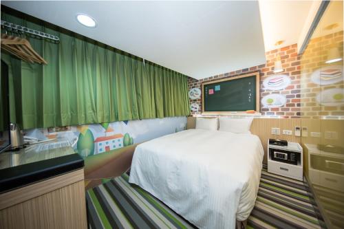 Katil atau katil-katil dalam bilik di Morwing Hotel - Culture Vogue