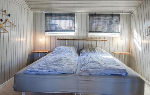 Ένα ή περισσότερα κρεβάτια σε δωμάτιο στο 1 Bedroom Amazing Home In Nexø