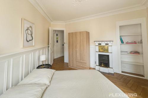 En eller flere senge i et værelse på Flexliving - Room - Lamarck