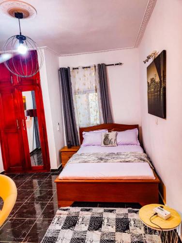 Postel nebo postele na pokoji v ubytování Chambre meublée DOm City - Yassa ari