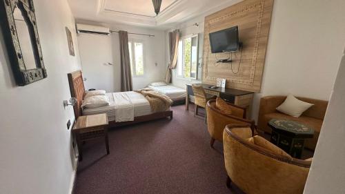 Postel nebo postele na pokoji v ubytování Isly Golf Hotel