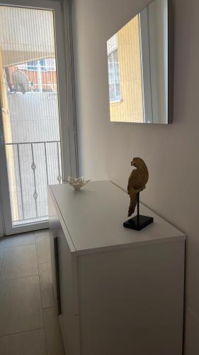 a statue of a bird sitting on top of a counter at Partenope in Termoli