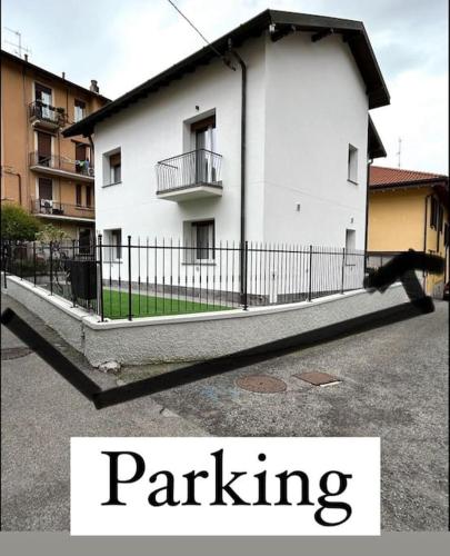 a person riding a skateboard in front of a building at DolceVita apartment in Como