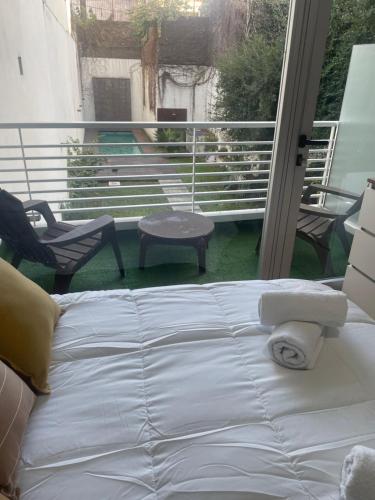 Ένα ή περισσότερα κρεβάτια σε δωμάτιο στο ManoloIII