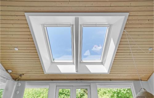 two windows in the ceiling of a house at 3 Bedroom Awesome Home In Ebeltoft in Ebeltoft