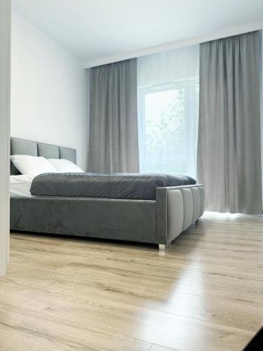 Katil atau katil-katil dalam bilik di Apartament 19