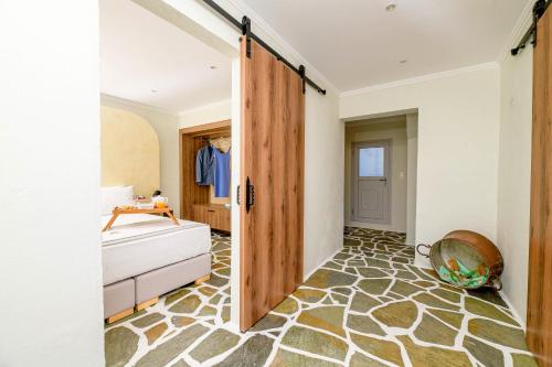 Letto o letti in una camera di Finesse Comfort Apartments