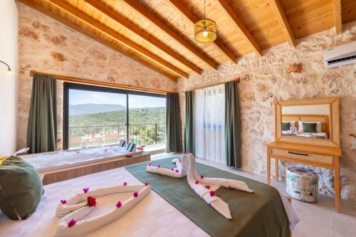 Postel nebo postele na pokoji v ubytování Villa Vita Kaş - Lüx Villa