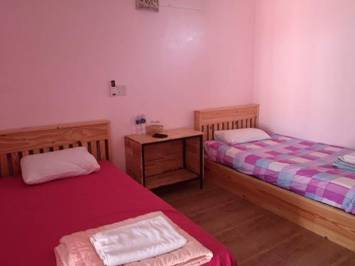 Postel nebo postele na pokoji v ubytování Campchamao