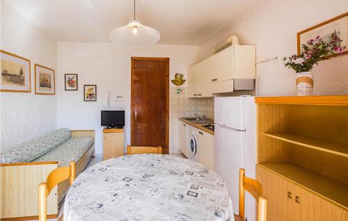 Kuchyň nebo kuchyňský kout v ubytování Ginestra Int,11B