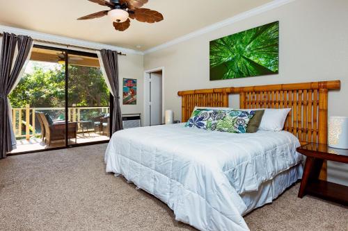 Ένα ή περισσότερα κρεβάτια σε δωμάτιο στο Cool & Quiet Wailea Oasis, Big Lanai + Two Pools
