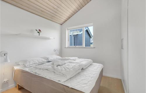 Postel nebo postele na pokoji v ubytování Holiday Home Flovt Havevej Haderslev Ix