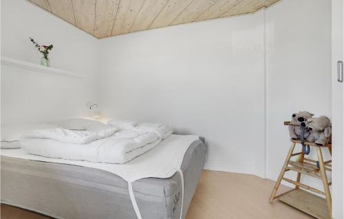 Postel nebo postele na pokoji v ubytování Holiday Home Flovt Havevej Haderslev Ix