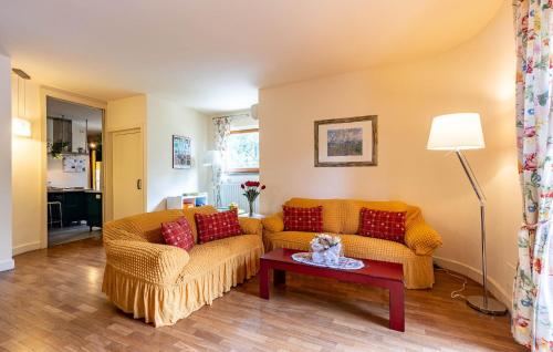 a living room with a couch and a table at Villa Elena in Barbaricina