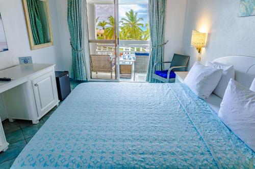 Ocean Point Beach Resort & Spa Adults Onlyにあるベッド