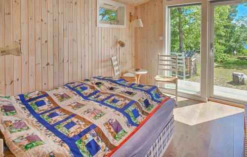 Ένα ή περισσότερα κρεβάτια σε δωμάτιο στο 4 Bedroom Stunning Home In Stathelle