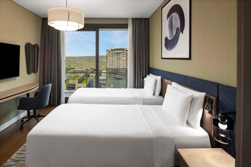 Cama o camas de una habitación en Radisson Residences Vadistanbul
