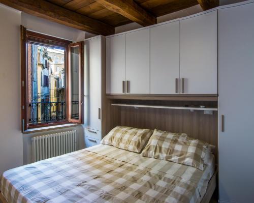 Ένα ή περισσότερα κρεβάτια σε δωμάτιο στο La Rocchetta
