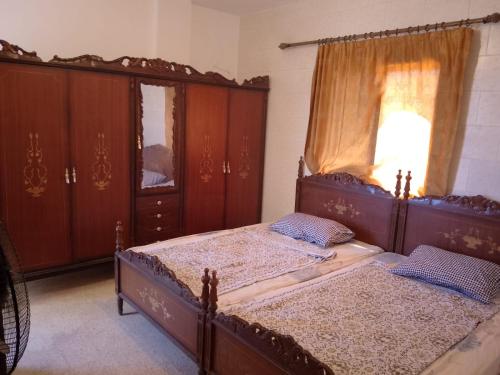 Ένα ή περισσότερα κρεβάτια σε δωμάτιο στο Saida FamilySeasideResort