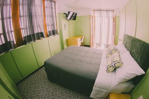 Ένα ή περισσότερα κρεβάτια σε δωμάτιο στο Lu De Anda Hotel Boutique