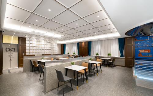 Zona de estar de Nost algia S Hotel Beijing Liangxiang University Town 时光漫步S酒店北京良乡大学城广阳城地铁站店 Free fresh ground coffee,Free laundry service