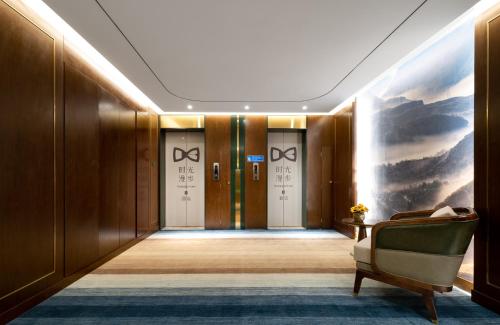 Imagen de la galería de Nost algia S Hotel Beijing Liangxiang University Town 时光漫步S酒店北京良乡大学城广阳城地铁站店 Free fresh ground coffee,Free laundry service, en Beijing