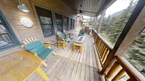 an overhead view of a porch with chairs and tables at Antlers Riverside Lodge in Red River