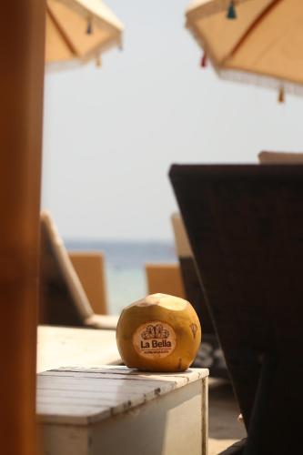 a melon sitting on top of a table at La Bella - Hotel Villa & Spa in Gili Trawangan