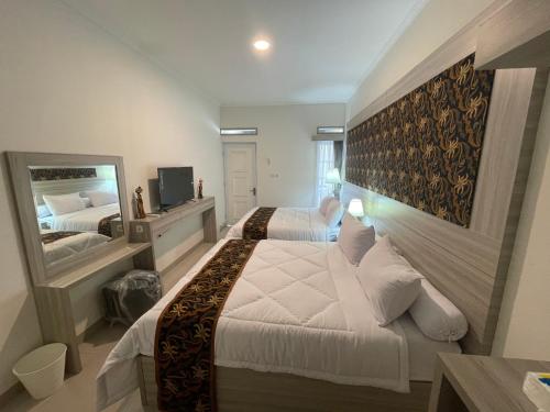 Μια τηλεόραση ή/και κέντρο ψυχαγωγίας στο Rent Studio2 full furnished