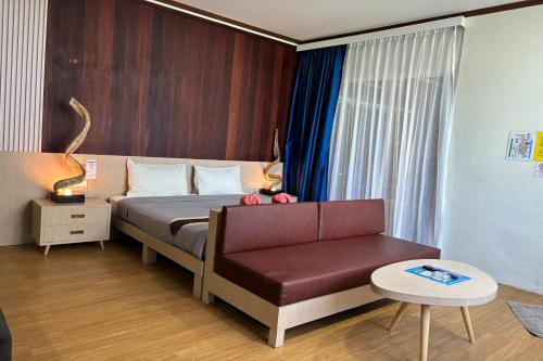 Postel nebo postele na pokoji v ubytování Paradise Resort Phi Phi