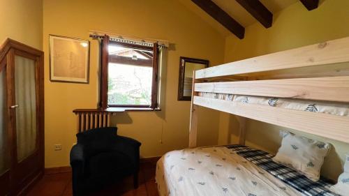 Ένα ή περισσότερα κρεβάτια σε δωμάτιο στο Casa CaChucho