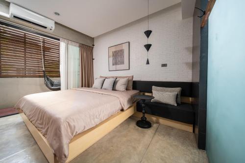 The Hotel Journal Chiangmaiにあるベッド